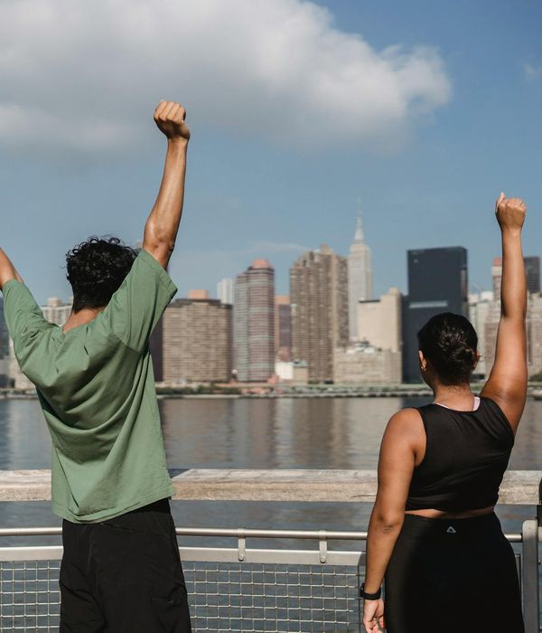 Woman feeling energized and happy outdoors in the morning.